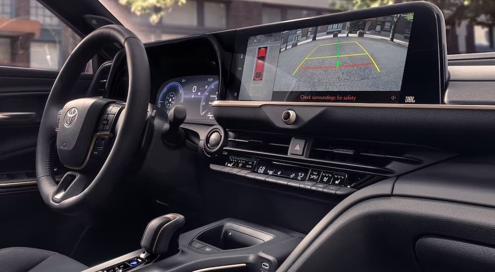 The dash of a 2023 Toyota Crown is shown from the passenger seat.
