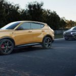 A yellow 2024 Dodge Hornet is shown from the side.