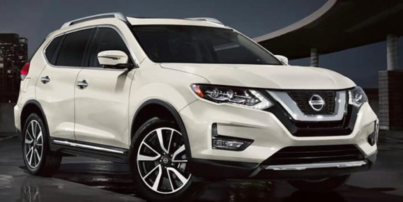 A white 2020 Nissan Rogue is shown from the front at an angle after leaving a used SUV dealer.