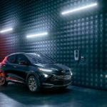 A black 2023 Chevy Bolt EUV Redline is shown from the front at an angle.