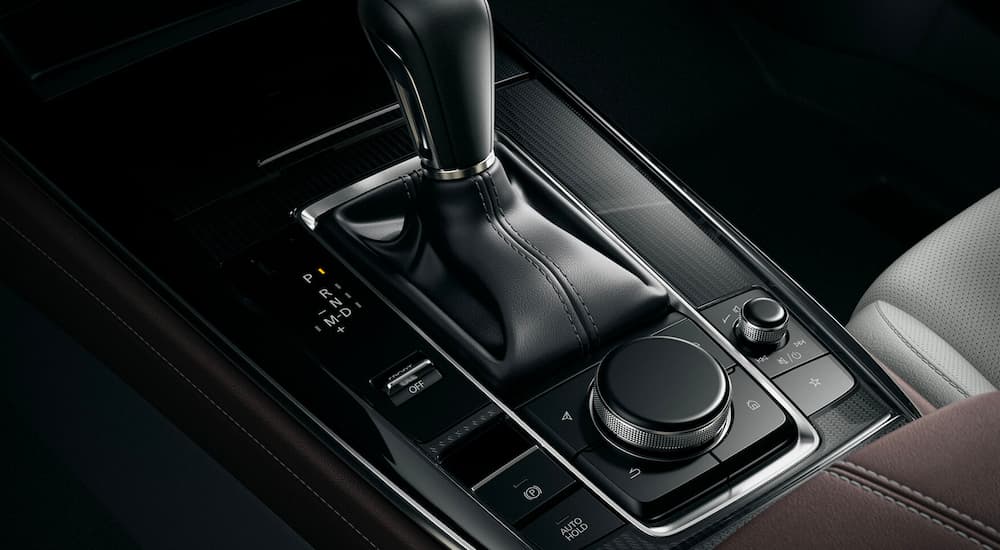 A close up shows the center console in a 2023 Mazda CX-30.
