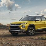 A yellow 2023 Chevy Trailblazer Activ is shown from the front at an angle after leaving a dealer that has SUVs for sale.