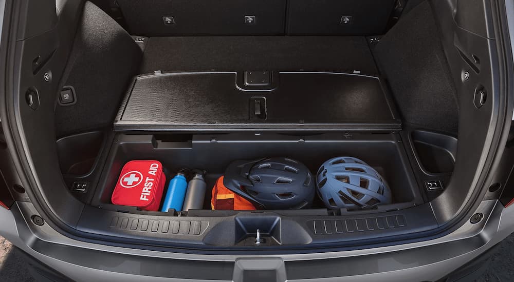 A close up of the rear storage in a 2023 Honda Passport for sale is shown.