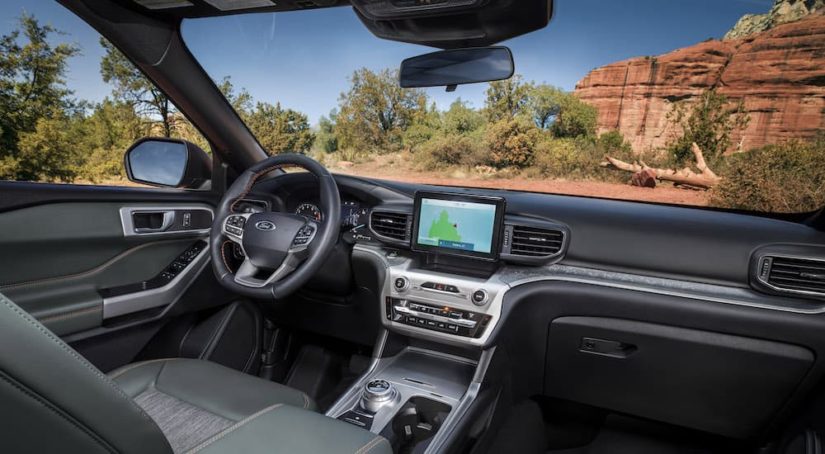 The interior of a 2021 Ford Explorer Timberline is shown from the passenger seat.