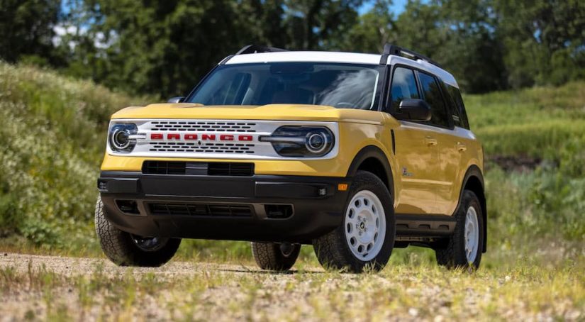 A yellow 2023 Ford Bronco Sport is shown from the front at an angle after leaving a Ford dealership.