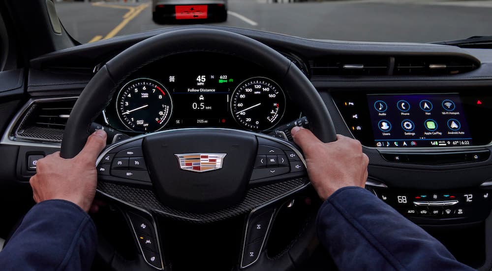 The black dash of a 2023 Cadillac XT5 is shown.