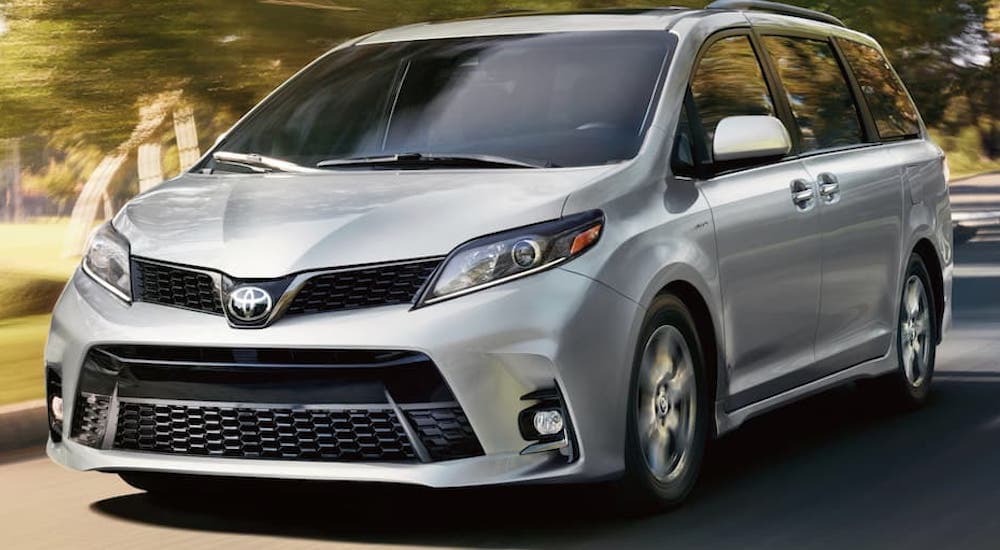 A silver 2018 Toyota Sienna is shown from the front at an angle.