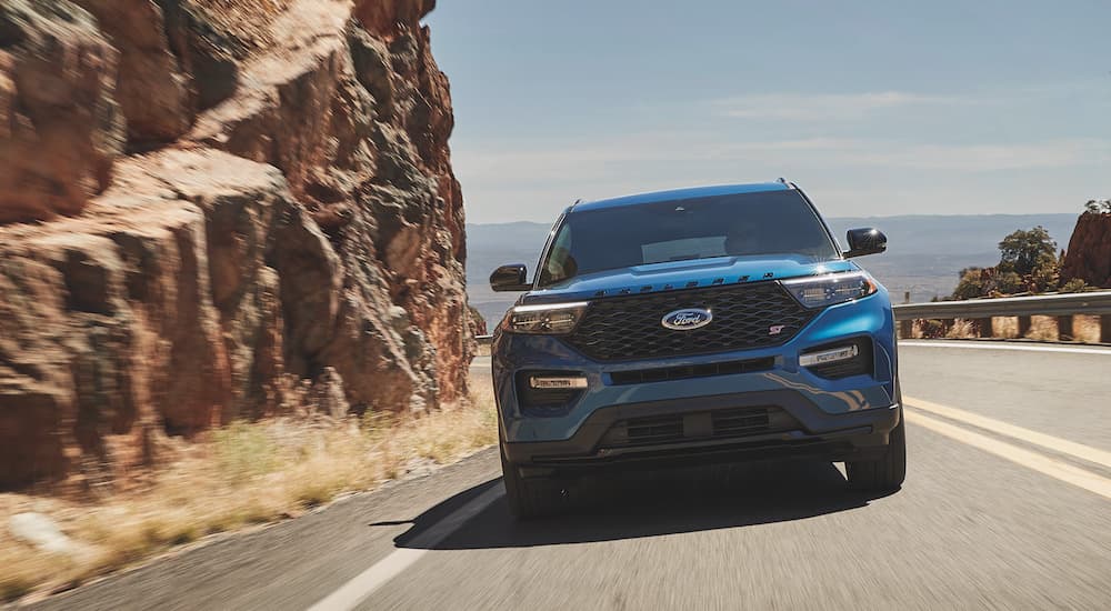 A blue 2023 Ford Explorer ST is shown from the front.