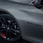 A close up shows the black wheel on a silver 2023 Chevy Malibu Redline after winning a 2023 Chevy Malibu vs 2023 Nissan Altima showdown.