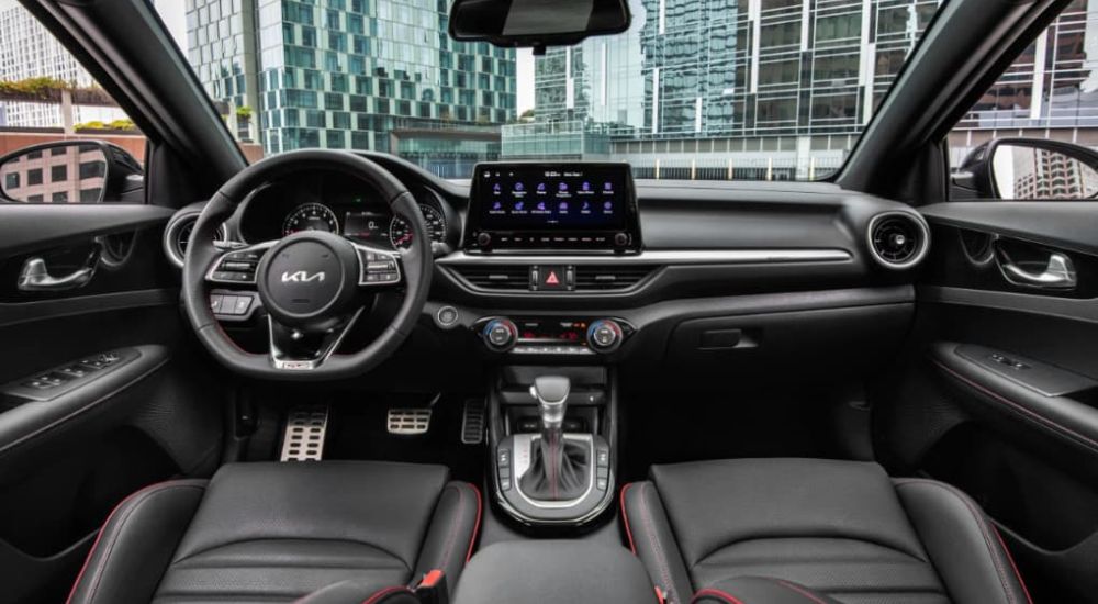 The front interior of the 2023 Kia Forte is shown. 