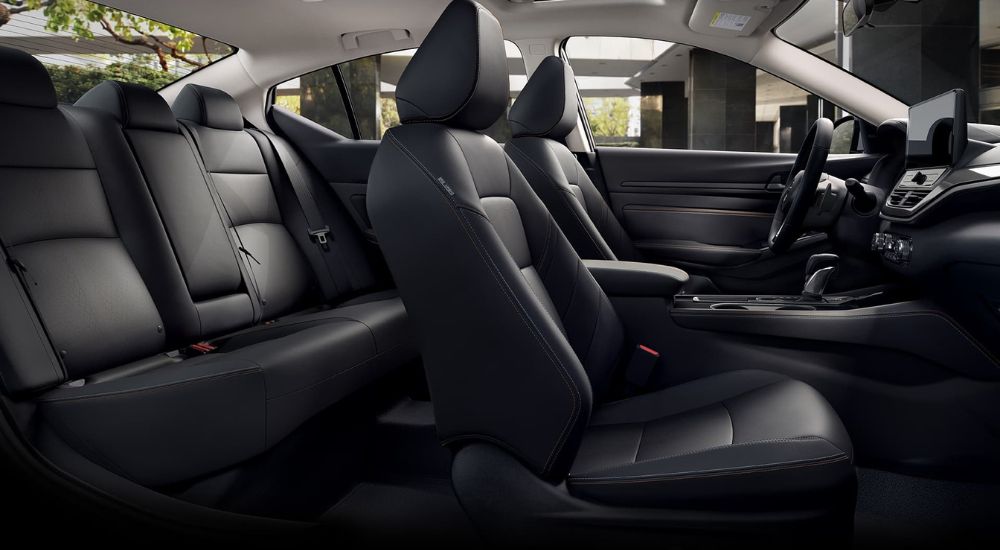 To show the difference between the 2023 Nissan Altima vs 2023 Subaru Legacy, the black leather interior of the Altima is displayed.