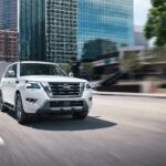 A white 2022 Nissan Armada is shown from the front at an angle.