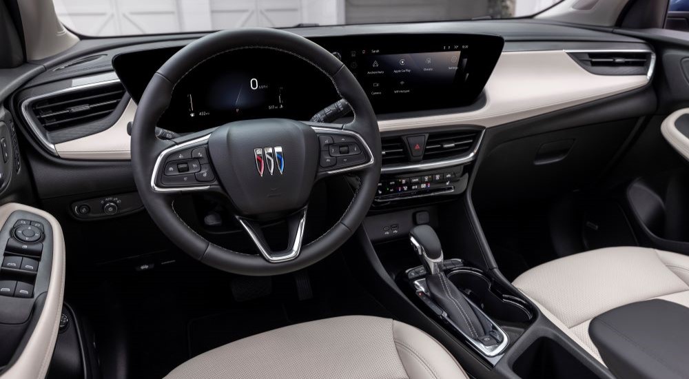 A close up shows the dash and interior is shown in a 2024 Buick Encore GX Avenir.