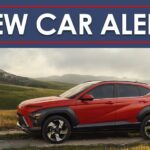 A red 2024 Hyundai Kona is shown under a new car alert banner.