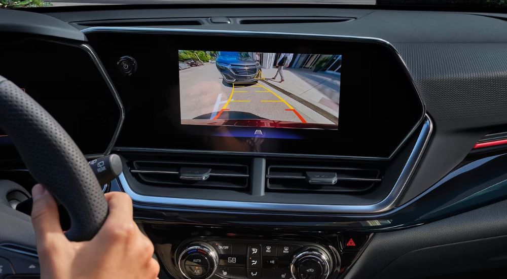 The infotainment screen of the 2024 Chevy Trax displays the feed from the backup camera. 
