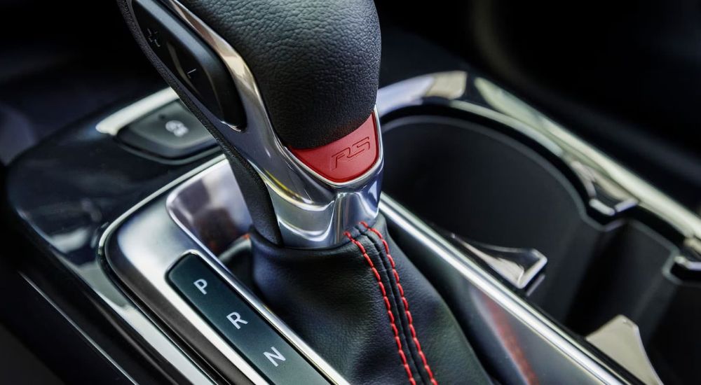 A close up of the 2024 Chevy Trax RS gear shift is shown. 