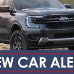 A grey 2024 Ford Ranger is shown parked in an open area.