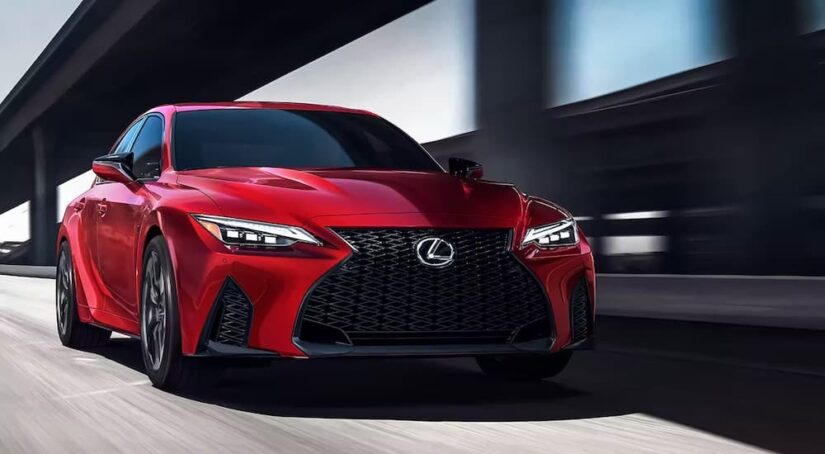 A red 2023 Lexus ISF is shown from the front at an angle after leaving a Lexus dealer.