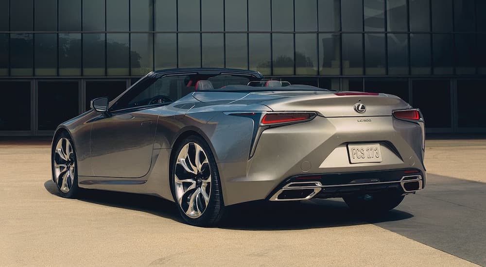 A silver 2023 Lexus LC500 convertible is shown from the rear at an angle.