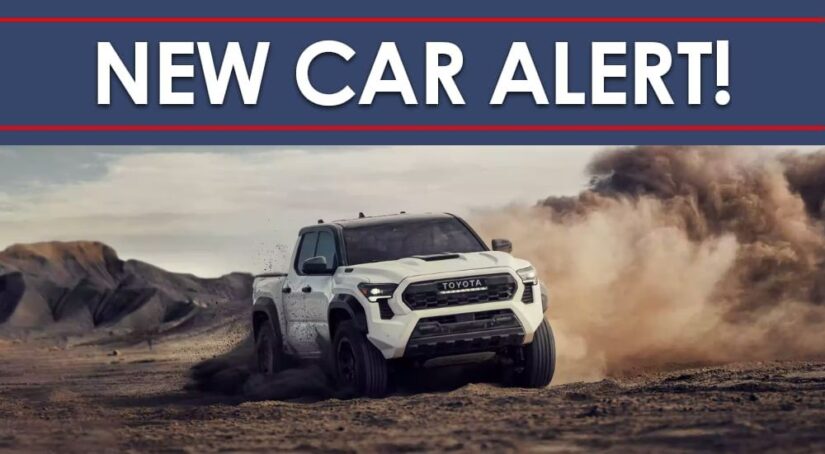 A white 2024 Toyota Tacoma TRD Pro is shown under a new car alert banner.
