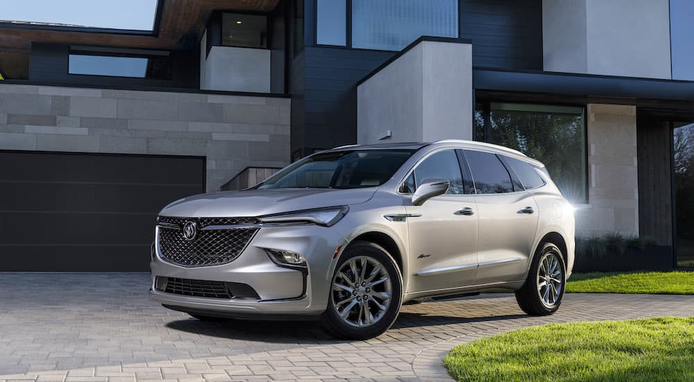 A silver 2022 Buick Enclave is shown from the front at an angle.