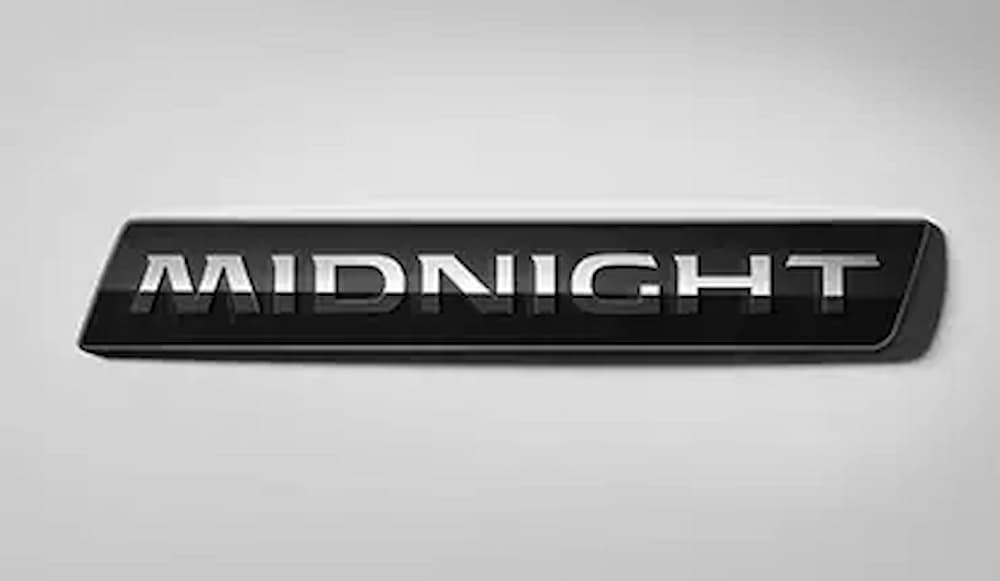 The badge of a 2023 Nissan Sentra Midnight Edition is shown.