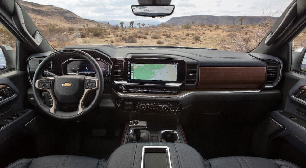The interior of a 2023 Chevy Silverado High Country is shown from above the center console.