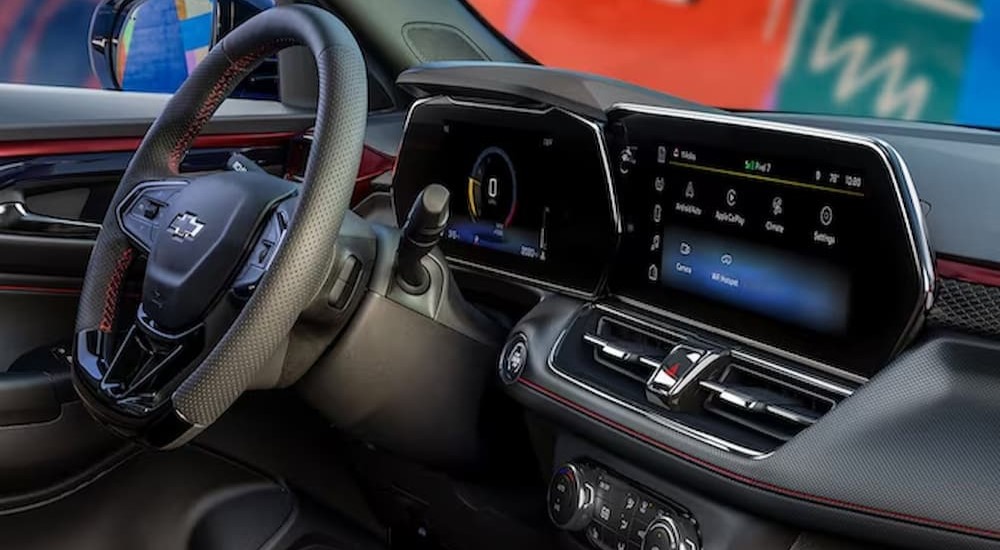 The black and red dash of a 2024 Chevy Trailblazer is shown.