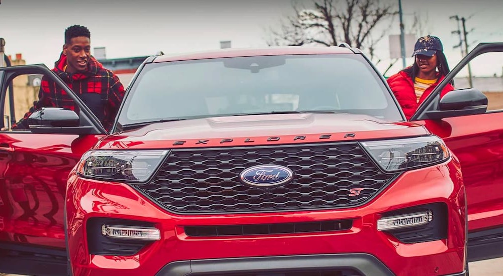 A red 2022 Ford Explorer ST is shown.