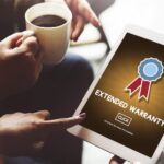 A tablet with an extended warranty offer is shown.