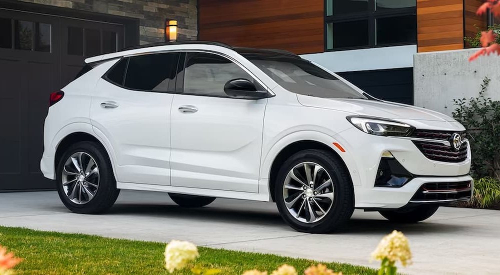A white 2023 Buick Encore GX is shown parked on a driveway.