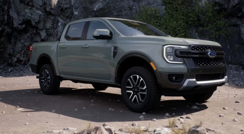 A gray 2024 Ford Ranger is shown parked on a beach.