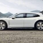 A white 2023 Porsche Taycan Cross Turismo is shown to be the best looking out of every station wagon you can buy in 2023.