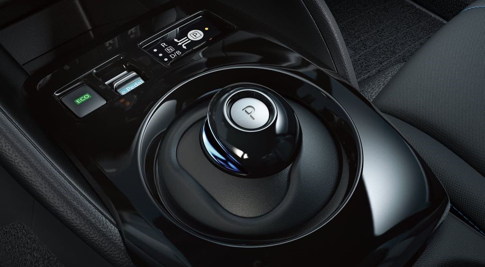 A close up shows the center console in a  2023 Nissan LEAF.