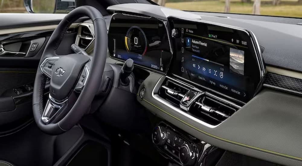 The gray interior and dash of a 2024 Chevy Trailblazer is shown.