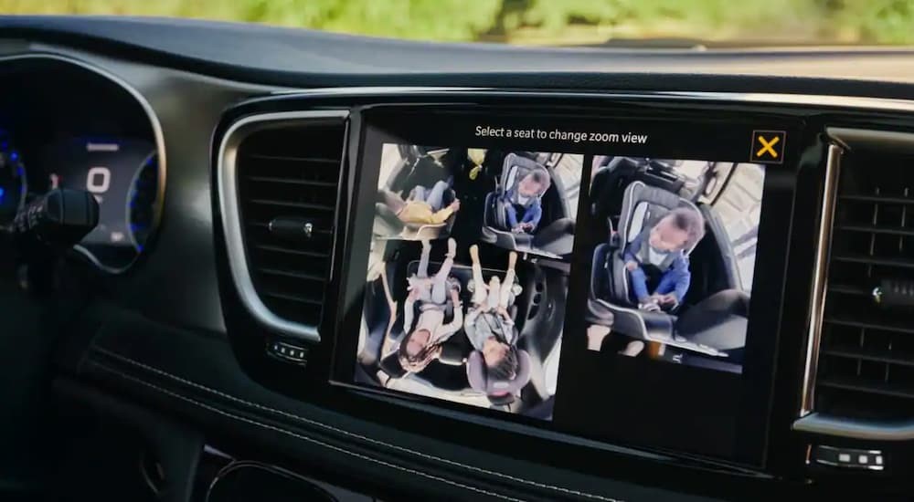 The black dash and FamCam in a 2023 Chrysler Pacifica is shown.