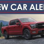 A red 2024 Ford F-150 Lariat is shown under a new car alert banner.