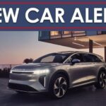 A New Car Alert banner is shown above a silver 2025 Lucid Air Gravity.