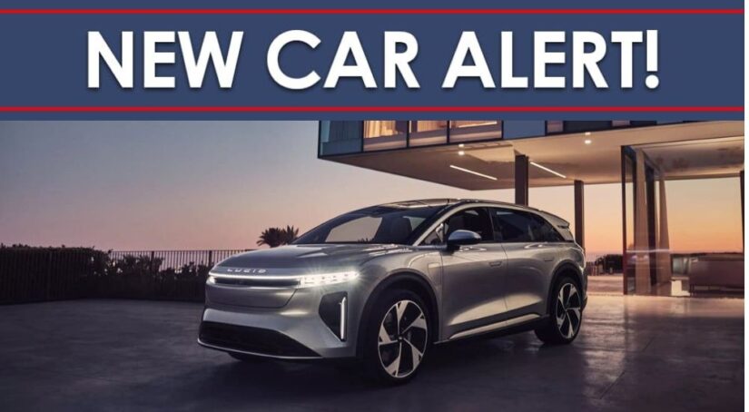 A New Car Alert banner is shown above a silver 2025 Lucid Air Gravity.