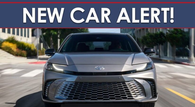 A New Car Alert banner is shown above a silver 2025 Toyota Camry.