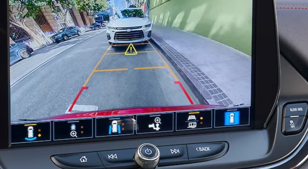The back up cam is shown being used in a 2024 Chevy Blazer.