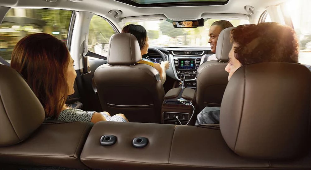 The gray and brown interior and dash of a 2024 Nissan Murano is shown.
