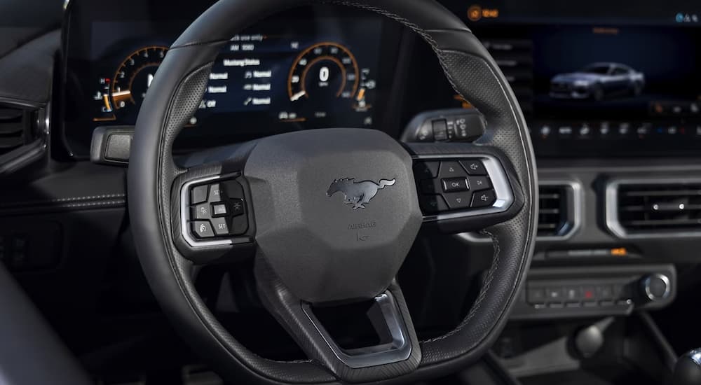 The steering wheel in a 2024 Ford Mustang.