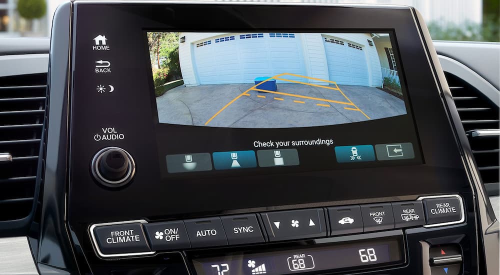 A closeup of the infotainment screen displaying the rear camera in a 2024 Honda Odyssey.