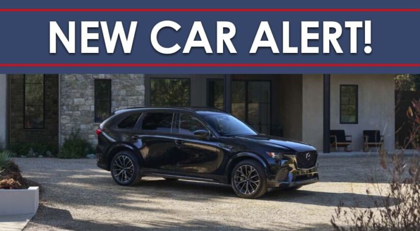 A black 2025 Mazda CX-70 is shown under a new car alert banner.