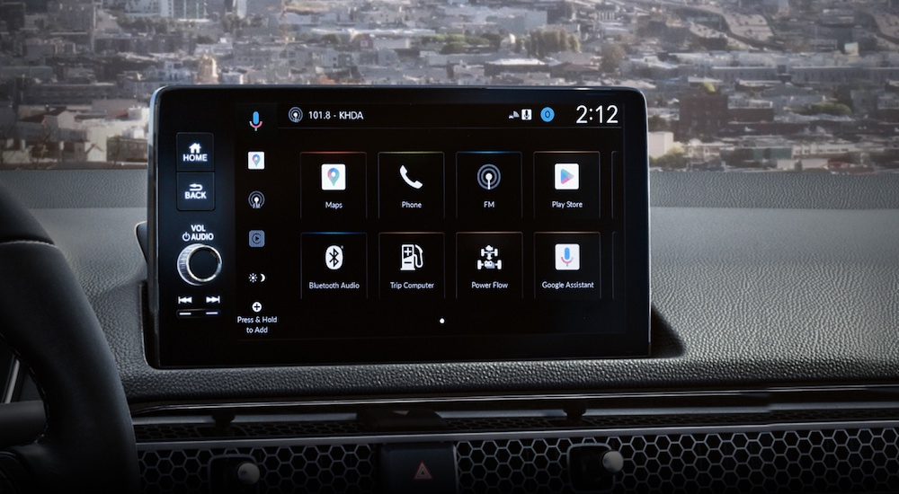 The infotainment screen in a 2025 Honda Civic is shown in close-up.