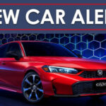 A red 2025 Honda Civic Sport Touring Hybrid is shown from the front at an angle.
