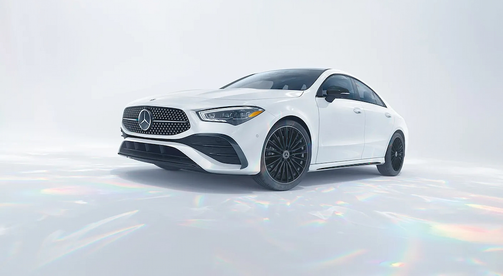 A white 2024 Mercedes-Benz CLA Coupe angled to the left.