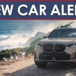 A tan 2025 X3 M50 xDrive is shown under a New Car Alert banner.
