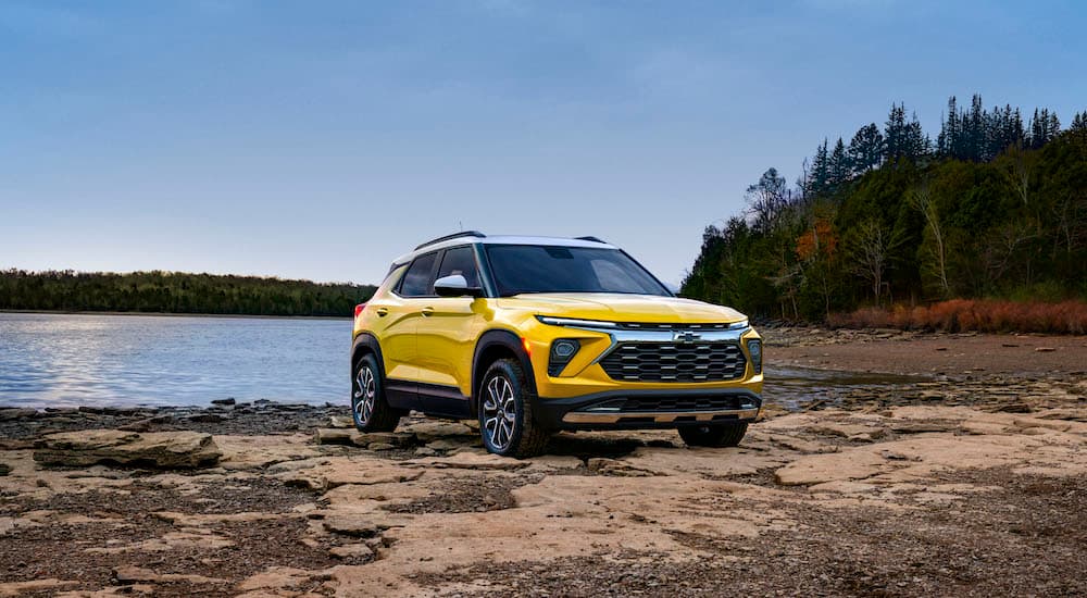 A yellow 2025 Chevy Trailblazer ACTIV is shown from the front at an angle.